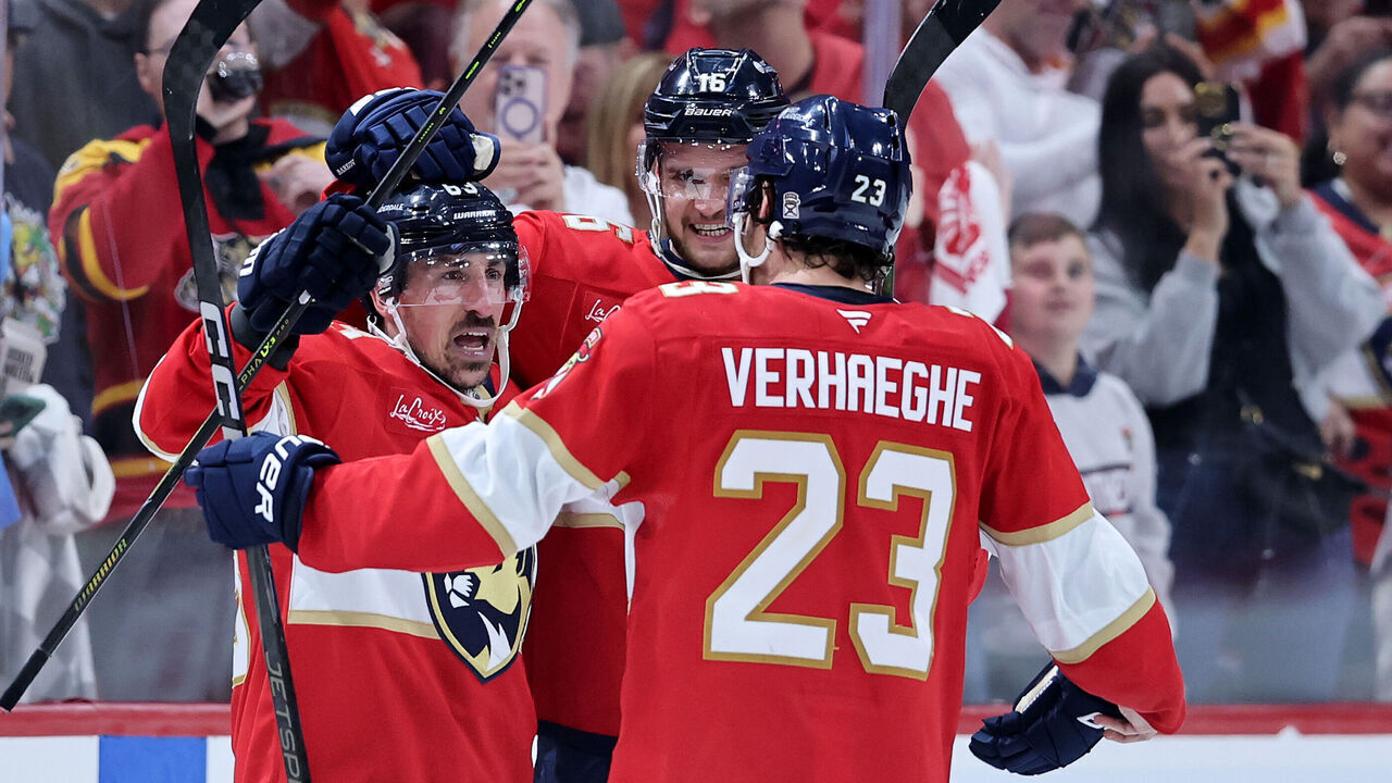 SUNRISE, FLORIDA - MAY 09: Brad Marchand #63 of the Florida Panthers celebrates with Aleksander Barkov #16 and Carter Verhaeghe #23 after scoring the game winning goal against Joseph Woll #60 of the Toronto Maple Leafs in overtime to win Game Three of the Second Round of the 2025 Stanley Cup Playoffs at Amerant Bank Arena on May 09, 2025 in Sunrise, Florida.