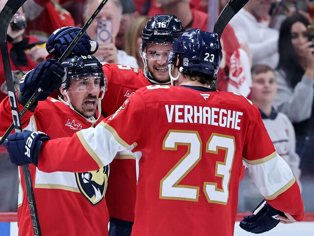 SUNRISE, FLORIDA - MAY 09: Brad Marchand #63 of the Florida Panthers celebrates with Aleksander Barkov #16 and Carter Verhaeghe #23 after scoring the game winning goal against Joseph Woll #60 of the Toronto Maple Leafs in overtime to win Game Three of the Second Round of the 2025 Stanley Cup Playoffs at Amerant Bank Arena on May 09, 2025 in Sunrise, Florida.
