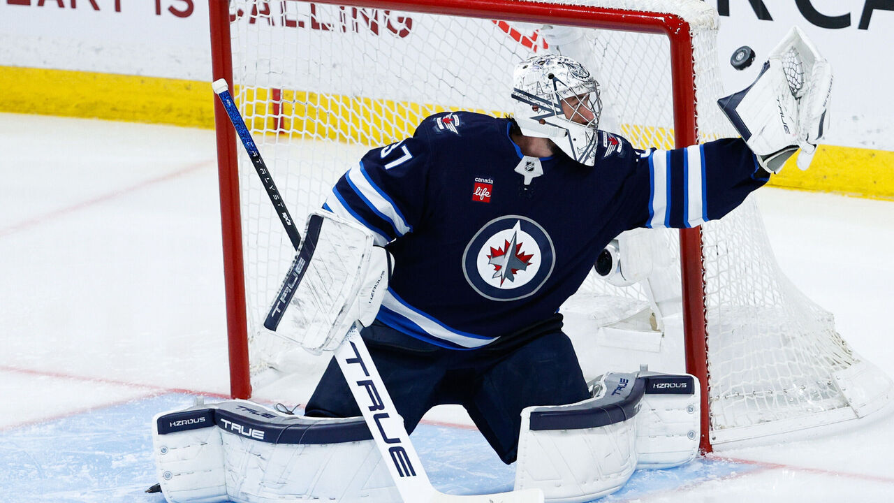 WINNIPEG, MB - MAY 04: Winnipeg Jets goalie Connor Hellebuyck (37) makes a save during the second period of game 7 of the first round of the Stanley Cup Playoffs between the Winnipeg Jets and the St. Louis Blues on May 04, 2025 at the Canada Life Centre Winnipeg, Manitoba.