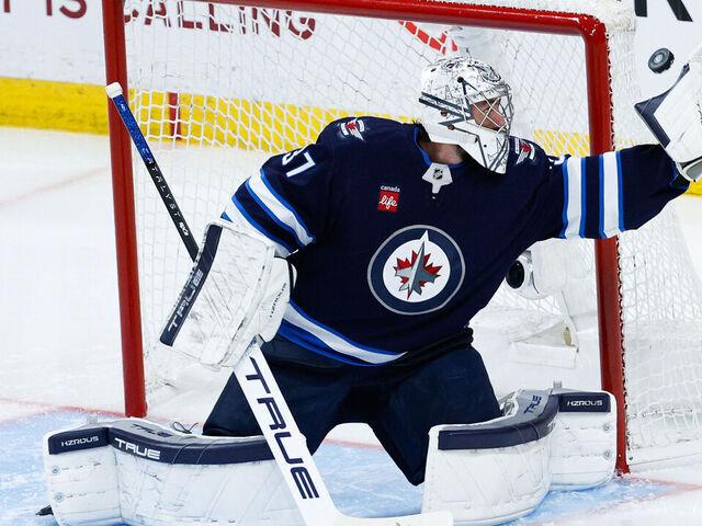 WINNIPEG, MB - MAY 04: Winnipeg Jets goalie Connor Hellebuyck (37) makes a save during the second period of game 7 of the first round of the Stanley Cup Playoffs between the Winnipeg Jets and the St. Louis Blues on May 04, 2025 at the Canada Life Centre Winnipeg, Manitoba.