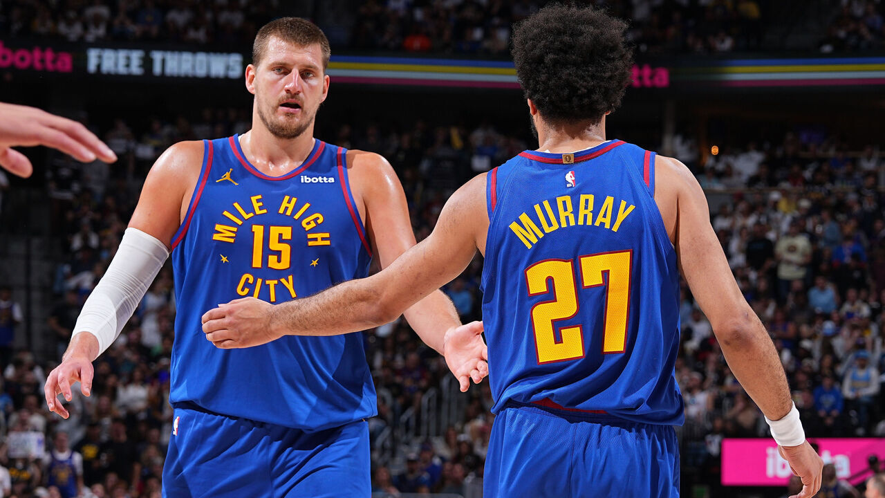 DENVER, CO - MAY 9: Nikola Jokic #15 of the Denver Nuggets and Jamal Murray #27 high five during Round Two, Game Three of the 2025 NBA Playoffs against the Oklahoma City Thunder on May 9, 2025 at Ball Arena in Denver, Colorado. NOTE TO USER: User expressly acknowledges and agrees that, by downloading and/or using this Photograph, user is consenting to the terms and conditions of the Getty Images License Agreement. Mandatory Copyright Notice: Copyright 2025 NBAE