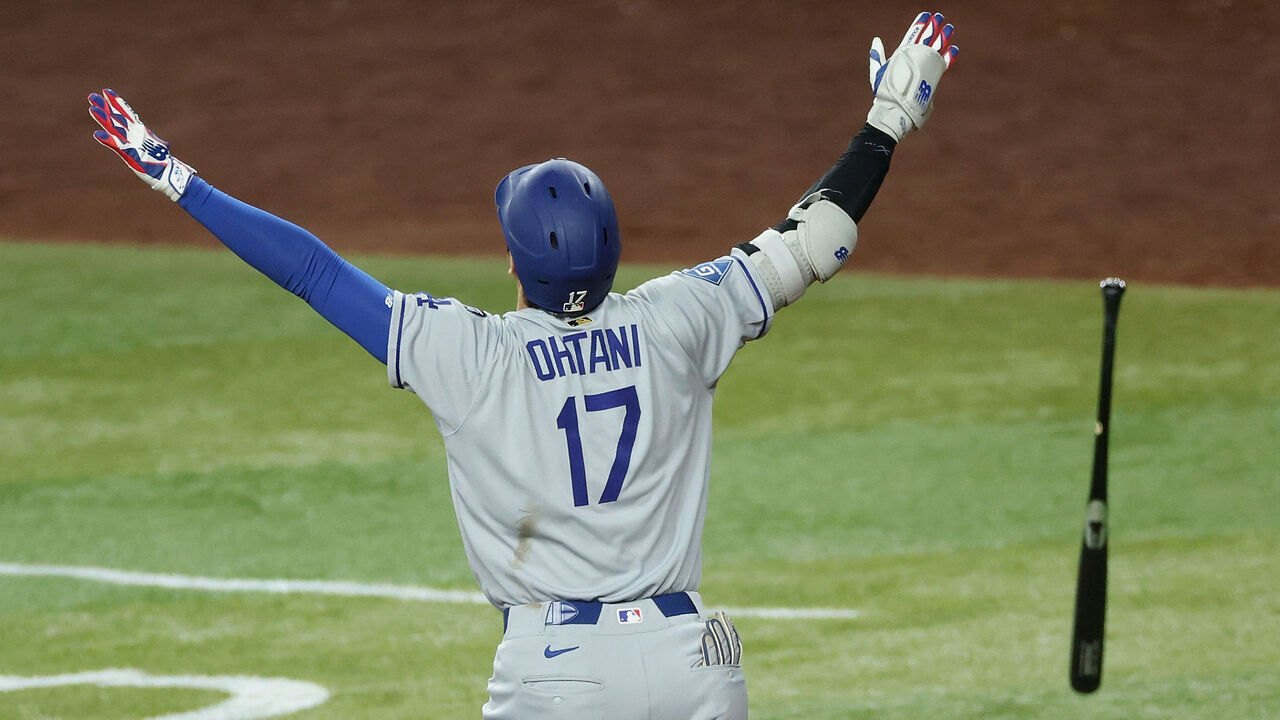 PHOENIX, ARIZONA - MAY 09: Shohei Ohtani #17 of the Los Angeles Dodgers reacts after hitting a three-run home run against the Arizona Diamondbacks during the ninthj inning of the MLB game at Chase Field on May 09, 2025 in Phoenix, Arizona.