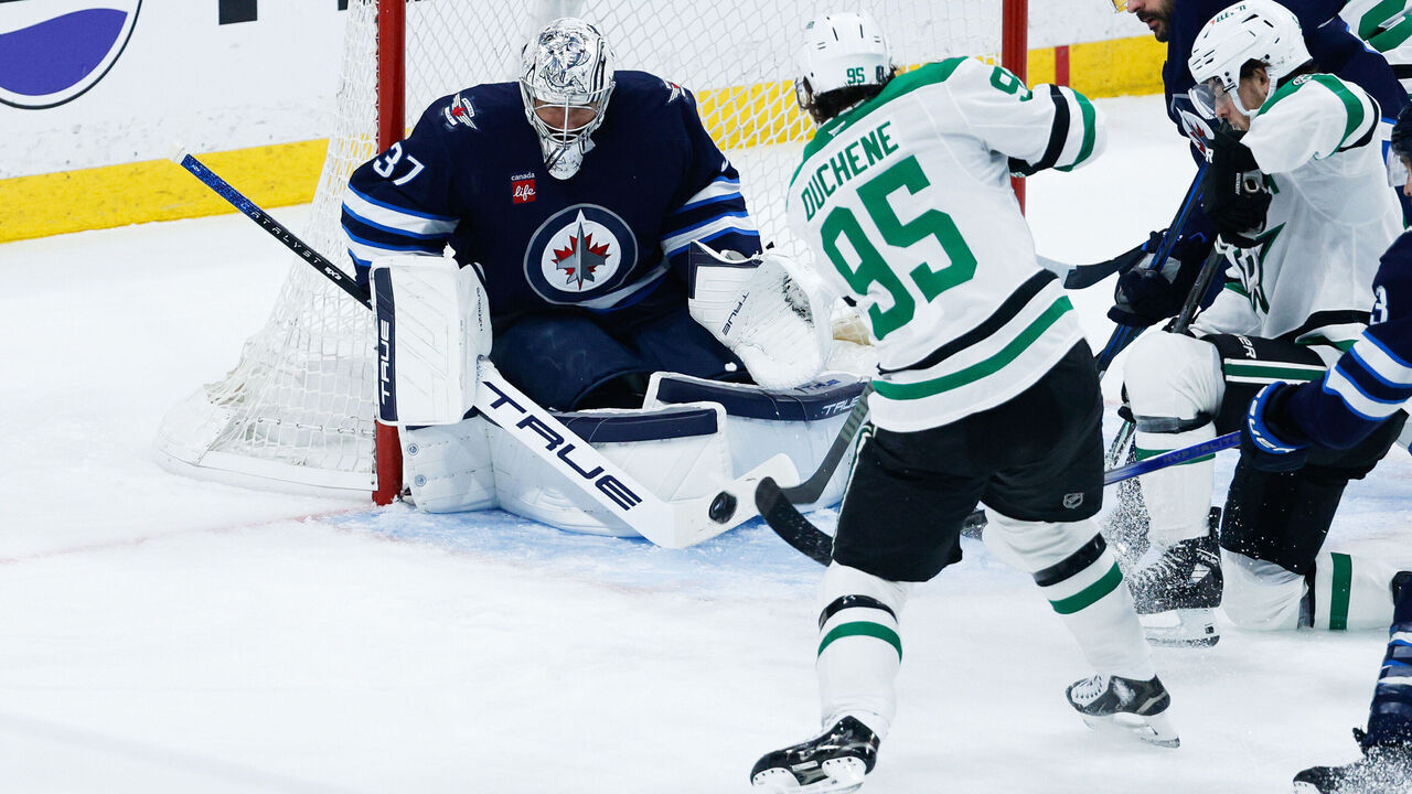 WINNIPEG, MB - MAY 09: Dallas Stars forward Matt Duchene (95) is stopped by Winnipeg Jets goalie Connor Hellebuyck (37) in game 2 of the second round of the Stanley Cup Playoffs between the Winnipeg Jets and the Dallas Stars on May 09, 2025 at the Canada Life Centre Winnipeg, Manitoba.