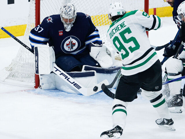 WINNIPEG, MB - MAY 09: Dallas Stars forward Matt Duchene (95) is stopped by Winnipeg Jets goalie Connor Hellebuyck (37) in game 2 of the second round of the Stanley Cup Playoffs between the Winnipeg Jets and the Dallas Stars on May 09, 2025 at the Canada Life Centre Winnipeg, Manitoba.