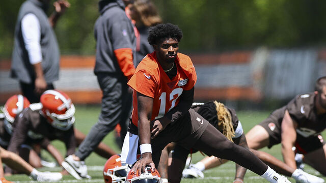 BEREA, OHIO - MAY 09: Shedeur Sanders #12 of the Cleveland Browns stretches during rookie minicamp at CrossCountry Mortgage Campus on May 09, 2025 in Berea, Ohio.