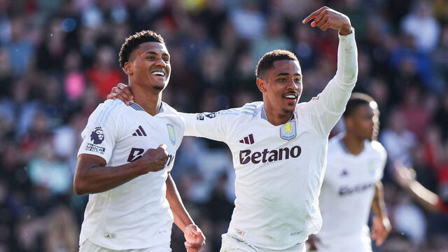 TOPSHOT - Aston Villa's English striker #11 Ollie Watkins (L) celebrates with Aston Villa's English midfielder #41 Jacob Ramsey after scoring his team first goal during the English Premier League football match between Bournemouth and Aston Villa at the Vitality Stadium in Bournemouth, southern England on May 10, 2025.