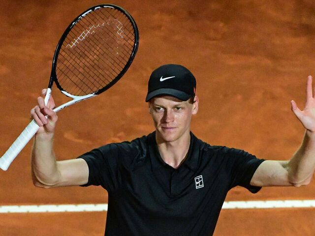 Italy's Jannik Sinner celebrates after winning against Argentina's Mariano Navone during their men's singles match of the ATP Rome Open tennis tournament at Foro Italico in Rome on May 10, 2025.