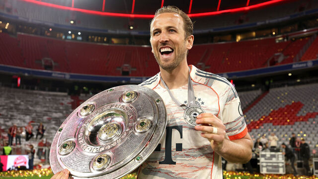 MUNICH, GERMANY - MAY 10: Harry Kane of Bayern Munich poses for a photo with the Meisterschale trophy and his medal after the teams 2-0 victory in the Bundesliga match between FC Bayern München and Borussia Mönchengladbach at Allianz Arena on May 10, 2025 in Munich, Germany.