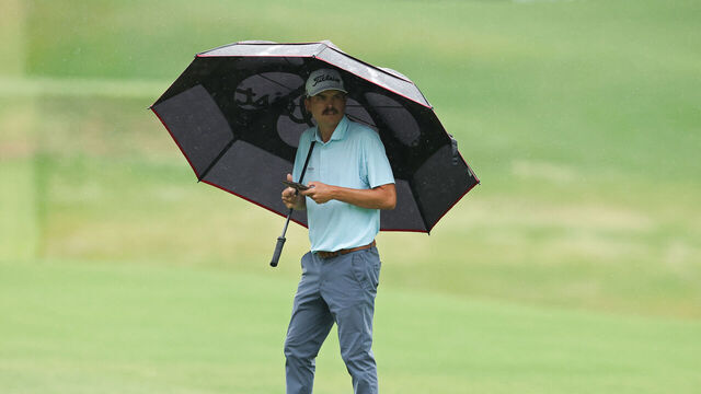 MYRTLE BEACH, SOUTH CAROLINA - MAY 10: Carson Young of the United States waits for his turn on the 18th hole during the third round of the ONEflight Myrtle Beach Classic 2025 at Dunes Golf & Beach Club on May 10, 2025 in Myrtle Beach, South Carolina.