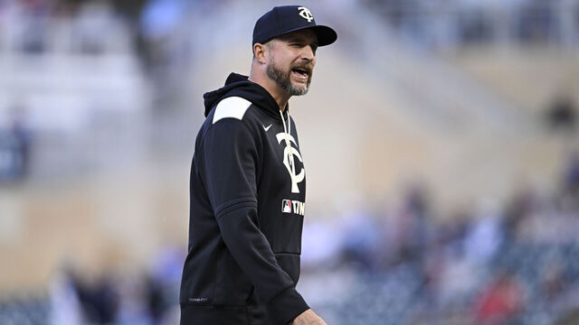 MINNEAPOLIS, MINNESOTA - MAY 7: Manager Rocco Baldelli #5 of the Minnesota Twins returns to the dugout after a mound visit in the fifth inning of the game against the Baltimore Orioles at Target Field on May 7, 2025 in Minneapolis, Minnesota.