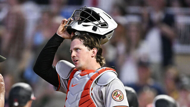 MINNEAPOLIS, MINNESOTA - MAY 6: Adley Rutschman #35 of the Baltimore Orioles reacts after a home run by Byron Buxton of the Minnesota Twins in the seventh inning at Target Field on May 6, 2025 in Minneapolis, Minnesota.