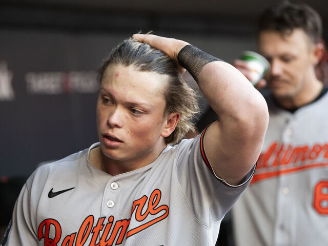 MINNEAPOLIS, MINNESOTA - MAY 7: Jackson Holliday #7 of the Baltimore Orioles looks on from the dugout in the fourth inning of the game against the Minnesota Twins at Target Field on May 7, 2025 in Minneapolis, Minnesota.