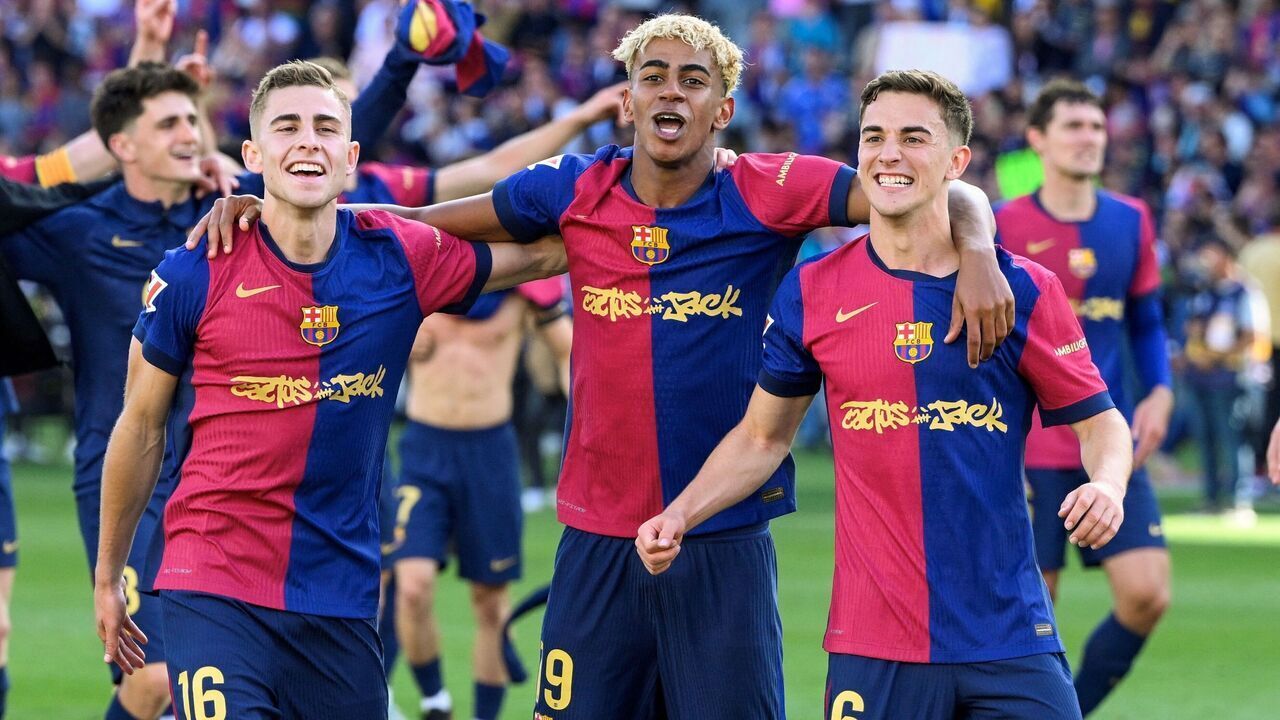 (From L) Barcelona's Spanish midfielder #16 Fermin Lopez, Barcelona's Spanish forward #19 Lamine Yamal and Barcelona's Spanish midfielder #06 Pablo Gavi celebrate victory at the end of the Spanish league football match between FC Barcelona and Real Madrid CF at Estadi Olimpic Lluis Companys in Barcelona, on May 11, 2025. Barcelona won 4-3.