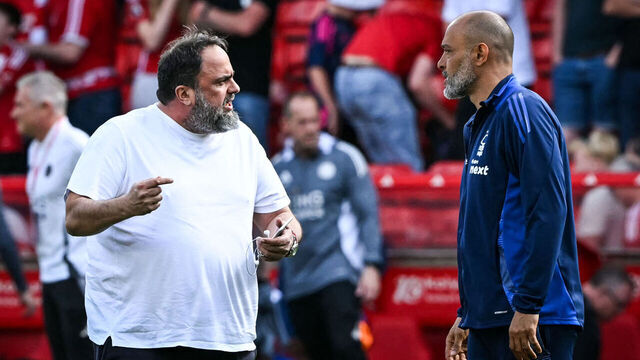 Nottingham Forest's Portuguese manager Nuno Espirito Santo (R) speaks with Nottingham Forest's Greek co-owner Evangelos Marinakis (L) at the end of the English Premier League football match between Nottingham Forest and Leicester City at The City Ground in Nottingham, central England, on May 11, 2025. Nottingham Forest and Leicester City equalise 2 - 2.