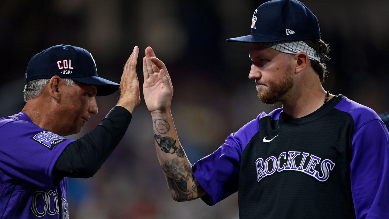 DENVER, CO - JULY 03: Kyle Freeland #21 of the Colorado Rockies is congratulated by Bud Black #10 after a 3-2 win over the St. Louis Cardinals at Coors Field on July 3, 2021 in Denver, Colorado.