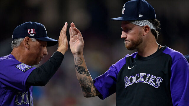 DENVER, CO - JULY 03: Kyle Freeland #21 of the Colorado Rockies is congratulated by Bud Black #10 after a 3-2 win over the St. Louis Cardinals at Coors Field on July 3, 2021 in Denver, Colorado.