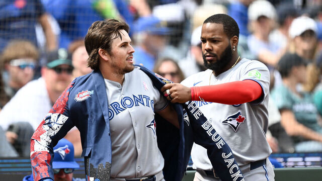 SEATTLE, WA - MAY 11: Addison Barger #47 of the Toronto Blue Jays celebrates with Vladimir Guerrero Jr. #27 after hitting a solo home run in the seventh inning during the game between the Toronto Blue Jays and the Seattle Mariners at T-Mobile Park on Sunday, May 11, 2025 in Seattle, Washington.