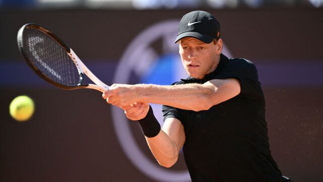 Italy's Jannik Sinner plays a backhand return to Netherland Jesper De Jong during their round of 16 men's singles match of the WTA Rome Open tennis tournament at Foro Italico in Rome on May 12, 2025.