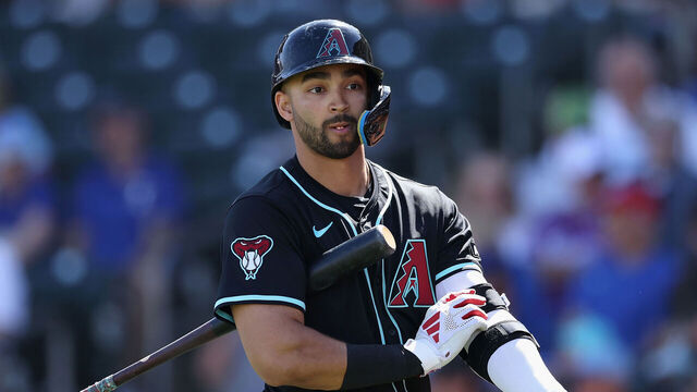 SURPRISE, ARIZONA - MARCH 02: Jordan Lawlar #10 of the Arizona Diamondbacks reacts to a strike out against the Texas Rangers during the first inning of the MLB game at Surprise Stadium on March 02, 2025 in Surprise, Arizona.