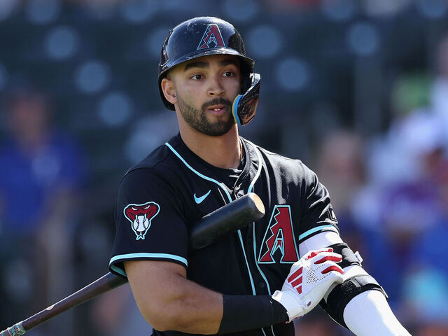 SURPRISE, ARIZONA - MARCH 02: Jordan Lawlar #10 of the Arizona Diamondbacks reacts to a strike out against the Texas Rangers during the first inning of the MLB game at Surprise Stadium on March 02, 2025 in Surprise, Arizona.