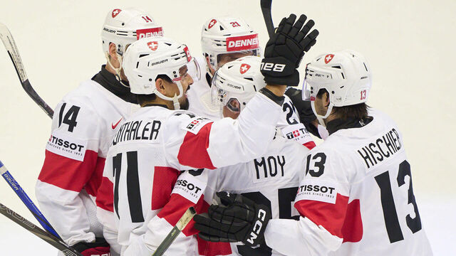 ODENSE, DENMARK - MAY 12: Jonas Siegenthaler #71 of Switzerland celebrates his 0-2 goal with Nico Hirschier #13 of Switzerland Dean Kukan #14 of Switzerland Tyler Moy #92 of Switzerland during the 2025 Ice Hockey World Championship match between United States and Switzerland at Jyske Bank Arena on May 12, 2025 in Odense, Denmark.