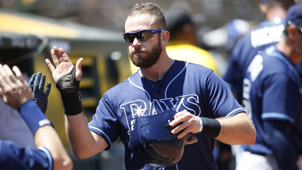 OAKLAND, CA - JULY 19: Evan Longoria #3 of the Tampa Bay Rays is congratulated at the dugout during the game against the Oakland Athletics at the Oakland Alameda Coliseum on July 19, 2017 in Oakland, California. The Athletes defeated the Rays 7-2.