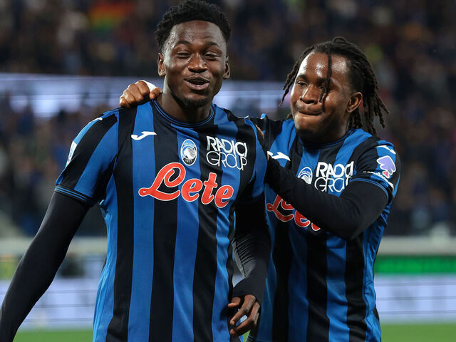 BERGAMO, ITALY - MAY 12: Ibrahim Sulemana of Atalanta celebrates with team mate Ademola Lookman after scoring to give the side a 2-1 lead during the Serie A match between Atalanta BC and AS Roma at Gewiss Stadium on May 12, 2025 in Bergamo, Italy.