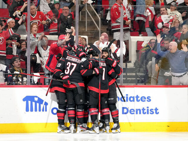 RALEIGH, NORTH CAROLINA - MAY 12: Seth Jarvis #24 of the Carolina Hurricanes celebrates with teammates after scoring a goal against the Washington Capitals during the second period of Game Four of the Second Round in the 2025 Stanley Cup Playoffs at at Lenovo Center on May 12, 2025 in Raleigh, North Carolina.