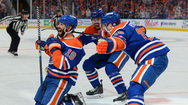 EDMONTON, CANADA - MAY 12: Adam Henrique #19, Zach Hyman #18 and Jake Walman #96 of the Edmonton Oilers celebrate a first-period goal against the Vegas Golden Knights during Game Four of the Second Round of the 2025 Stanley Cup Playoffs at Rogers Place on May 12, 2025, in Edmonton, Alberta, Canada.