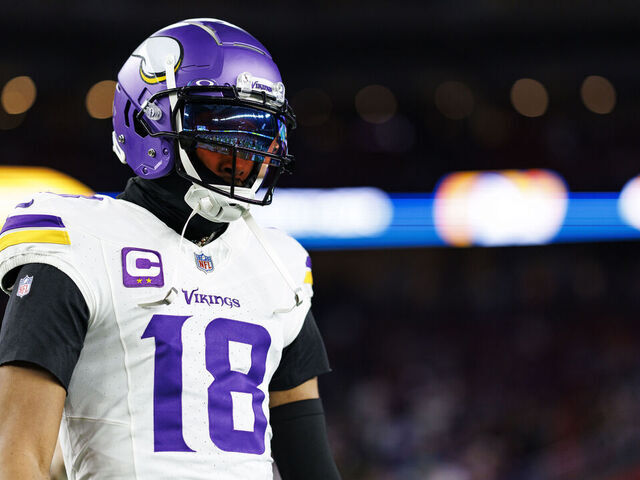 GLENDALE, ARIZONA - JANUARY 13: Wide receiver Justin Jefferson #18 of the Minnesota Vikings stands on the field prior to an NFC Wild Card game against the Los Angeles Rams, at State Farm Stadium on January 13, 2025 in Glendale, Arizona.