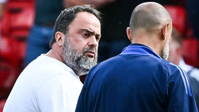 Nottingham Forest's Portuguese manager Nuno Espirito Santo (R) speaks with Nottingham Forest's Greek co-owner Evangelos Marinakis (L) at the end of the English Premier League football match between Nottingham Forest and Leicester City at The City Ground in Nottingham, central England, on May 11, 2025. Nottingham Forest and Leicester City equalise 2 - 2.
