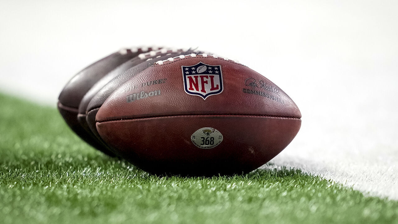 DETROIT, MICHIGAN - NOVEMBER 17: A general view of Wilson brand footballs with the NFL logo before the game between the Detroit Lions and Jacksonville Jaguars at Ford Field on November 17, 2024 in Detroit, Michigan.
