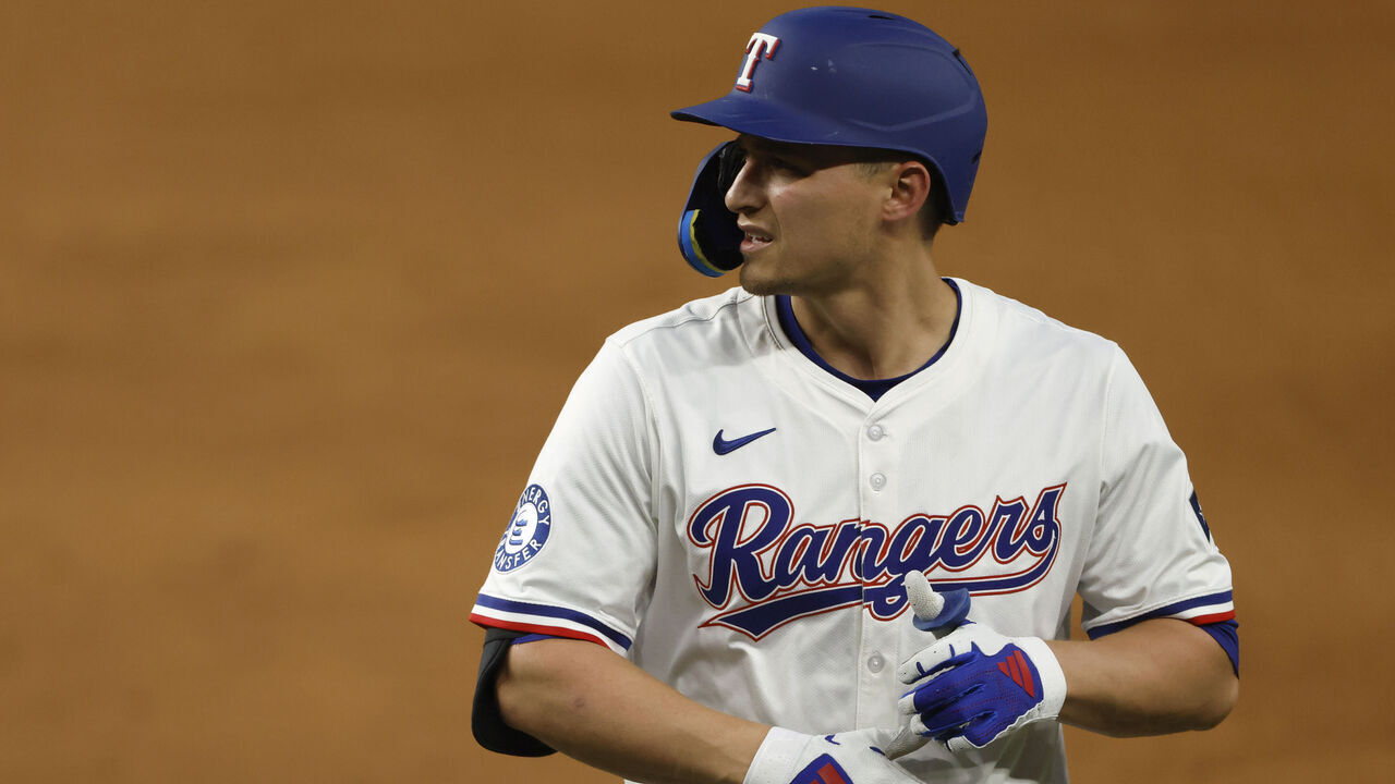 ARLINGTON, TX - MAY 3: Corey Seager #5 of the Texas Rangers looks on after flying out against the Seattle Mariners during the eighth inning at Globe Life Field on May 3, 2025 in Arlington, Texas.