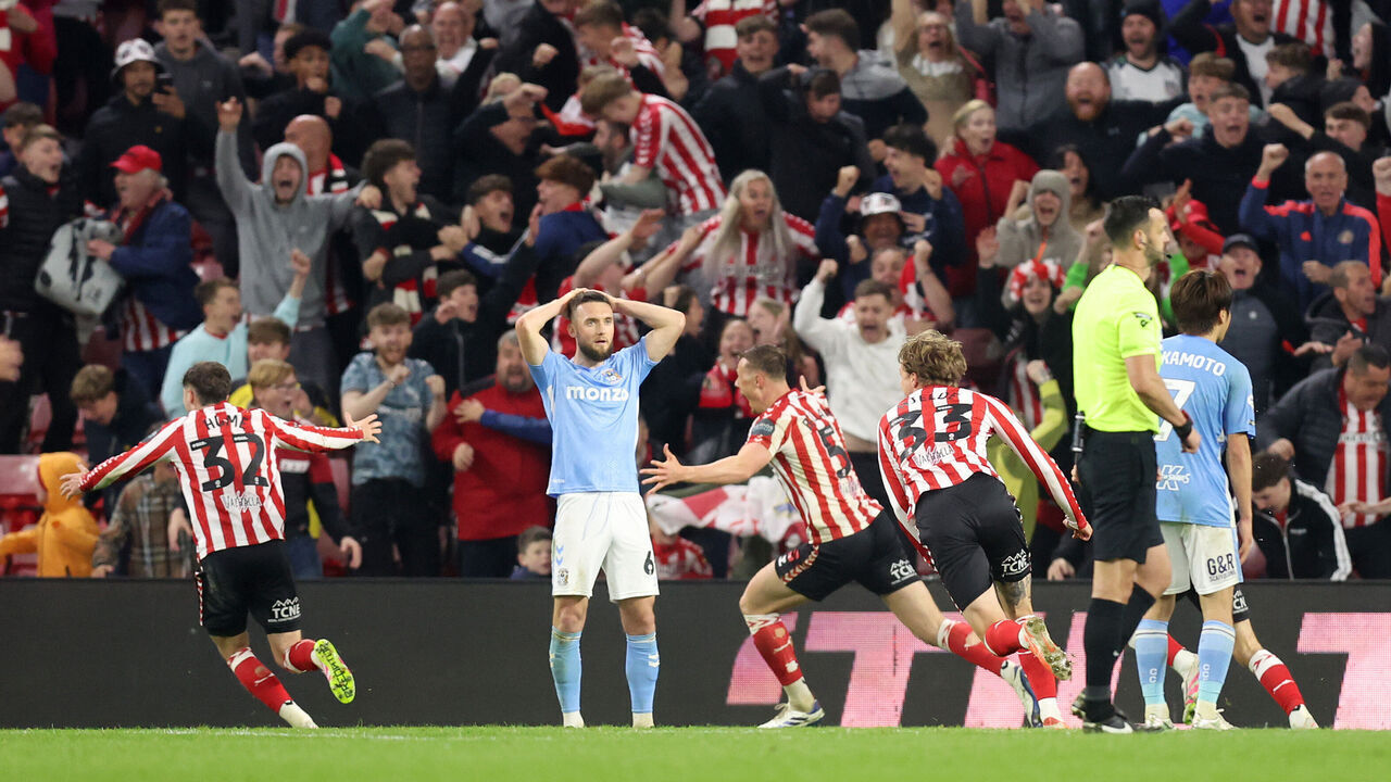 SUNDERLAND, ENGLAND - MAY 13: Daniel Ballard of Sunderland celebrates scoring his team's first goal during the Sky Bet Championship Play-Off Semi Final Second Leg match between AFC Sunderland and Coventry City at Stadium of Light on May 13, 2025 in Sunderland, England.