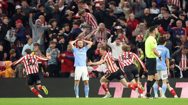 SUNDERLAND, ENGLAND - MAY 13: Daniel Ballard of Sunderland celebrates scoring his team's first goal during the Sky Bet Championship Play-Off Semi Final Second Leg match between AFC Sunderland and Coventry City at Stadium of Light on May 13, 2025 in Sunderland, England.