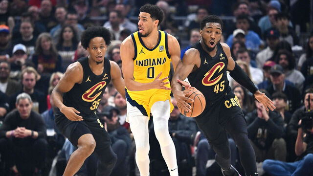 CLEVELAND, OHIO - MAY 13: Donovan Mitchell #45 of the Cleveland Cavaliers steals the ball from Tyrese Haliburton #0 of the Indiana Pacers during the first quarter in Game Five of the Eastern Conference Second Round NBA Playoffs at Rocket Arena on May 13, 2025 in Cleveland, Ohio.