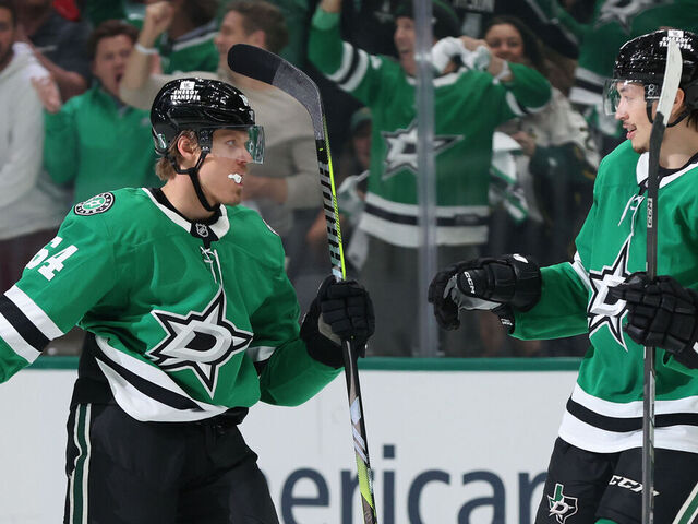 DALLAS, TEXAS - MAY 13: Mikael Granlund #64 of the Dallas Stars is congratulated by Jason Robertson #21 after Granlund scored a goal against the Winnipeg Jets during the first period of Game Four of the Second Round in the 2025 Stanley Cup Playoffs at American Airlines Center on May 13, 2025 in Dallas, Texas.