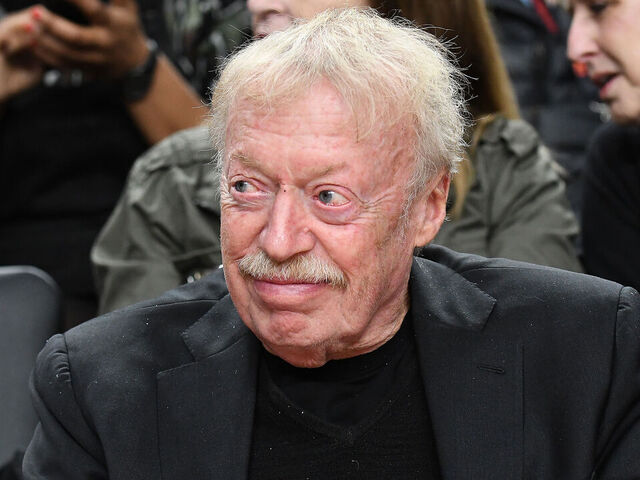 PORTLAND, OR - NOVEMBER 26: Nike co-founder Phil Knight observes pre-game in the championship game of the Victory Bracket at the PK80-Phil Knight Invitational between the North Carolina Tar Heels and Michigan State Spartans on November 26, 2017, at Moda Center in Portland, OR.