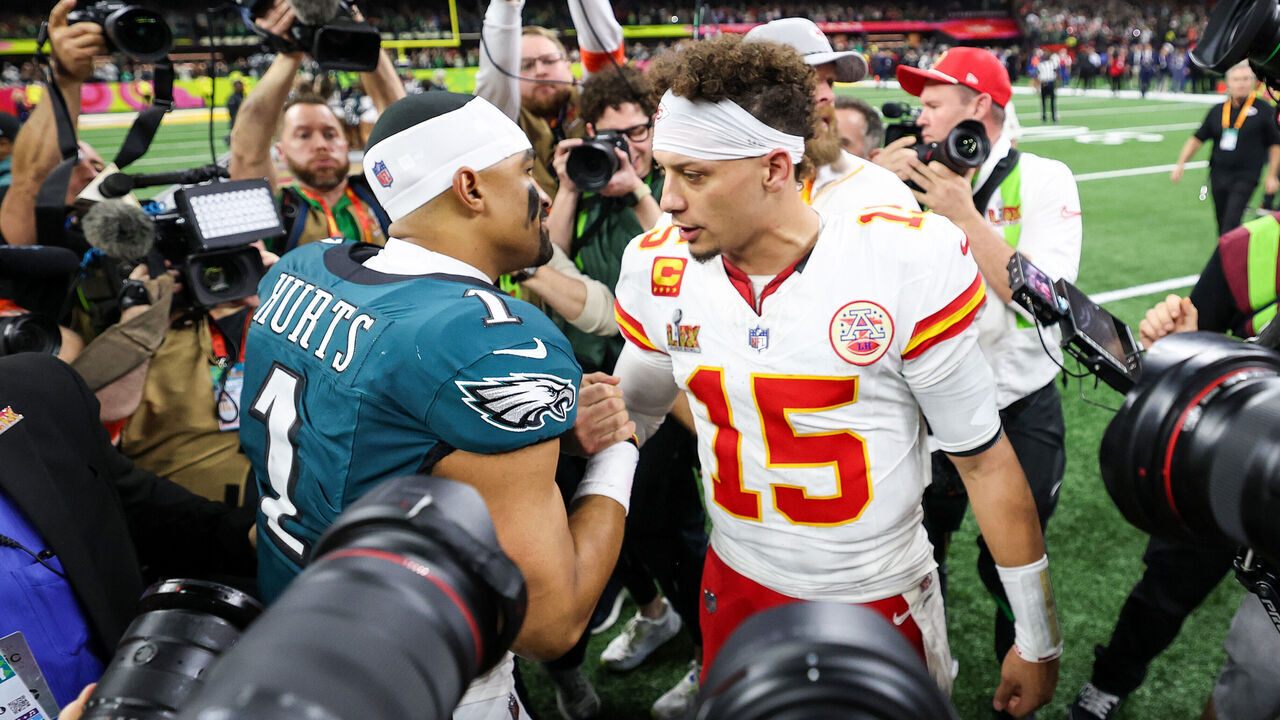 NEW ORLEANS, LOUISIANA - FEBRUARY 09: Jalen Hurts #1 of the Philadelphia Eagles and Patrick Mahomes #15 of the Kansas City Chiefs embrace after Super Bowl LIX at Caesars Superdome on February 09, 2025 in New Orleans, Louisiana.