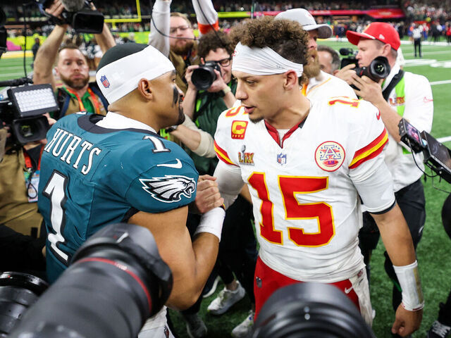 NEW ORLEANS, LOUISIANA - FEBRUARY 09: Jalen Hurts #1 of the Philadelphia Eagles and Patrick Mahomes #15 of the Kansas City Chiefs embrace after Super Bowl LIX at Caesars Superdome on February 09, 2025 in New Orleans, Louisiana.