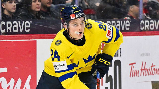 OTTAWA, CANADA - JANUARY 05: Tom Willander #24 of Team Sweden skates the puck in the third period against Team Czechia of the bronze medal game during the 2025 IIHF World Junior Championship at Canadian Tire Centre on January 5, 2025 in Ottawa, Ontario, Canada. Team Czechia defeated Team Sweden 3-2 in a shootout.