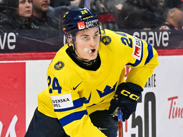 OTTAWA, CANADA - JANUARY 05: Tom Willander #24 of Team Sweden skates the puck in the third period against Team Czechia of the bronze medal game during the 2025 IIHF World Junior Championship at Canadian Tire Centre on January 5, 2025 in Ottawa, Ontario, Canada. Team Czechia defeated Team Sweden 3-2 in a shootout.