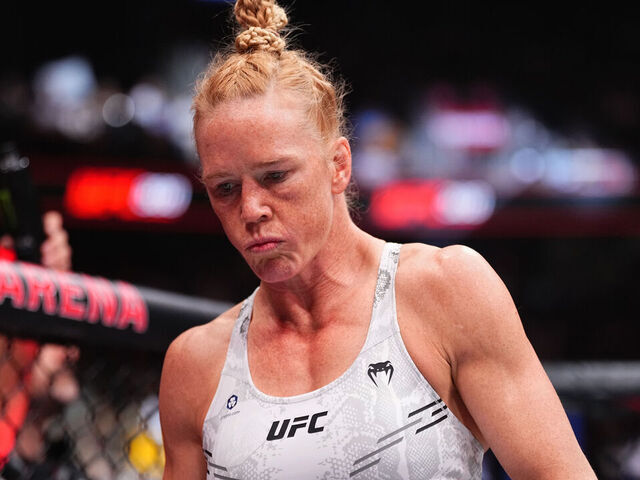 LAS VEGAS, NEVADA - APRIL 13: Holly Holm enters the Octagon in a bantamweight fight during the UFC 300 event at T-Mobile Arena on April 13, 2024 in Las Vegas, Nevada.