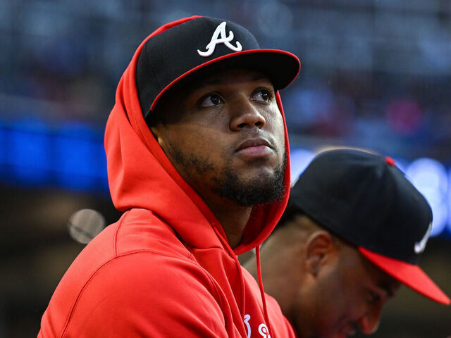 ATLANTA, GA SEPTEMBER 13: Injured Atlanta outfielder Ronald Acuna Jr. (13) in the dugout during the MLB game between the Los Angeles Dodgers and the Atlanta Braves on September 13th, 2024 at Truist Park in Atlanta, GA.