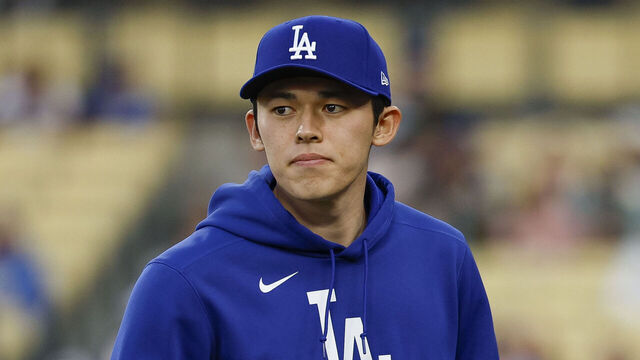 LOS ANGELES, CALIFORNIA - APRIL 28: Roki Sasaki #11 of the Los Angeles Dodgers stands on the field prior to a game against the Miami Marlins at Dodger Stadium on April 28, 2025 in Los Angeles, California.