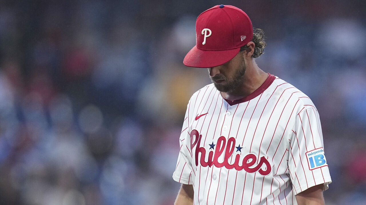 PHILADELPHIA, PENNSYLVANIA - MAY 14: Aaron Nola #27 of the Philadelphia Phillies walks to the dugout after being removed from the game in the top of the fourth inning against the St. Louis Cardinals during game two of a doubleheader at Citizens Bank Park on May 14, 2025 in Philadelphia, Pennsylvania. The Cardinals defeated the Phillies 14-7.