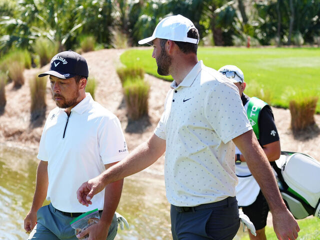 PONTE VEDRA BEACH, FL - MARCH 13: PGA golfers Xander Schauffele and Scottie Scheffler walk the 5th hole during the The Players Championship at the Stadium Course at TPC Sawgrass on March 13, 2025, at Ponte Verde Beach, Florida.