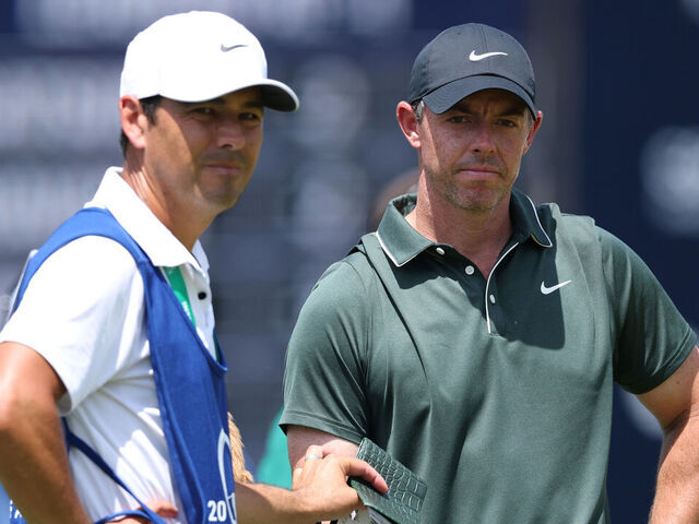 CHARLOTTE, NORTH CAROLINA - MAY 15: Rory McIlroy of Northern Ireland and Caddie Harry Diamond look on from the fourth green during the first round of the PGA Championship at Quail Hollow Country Club on May 15, 2025 in Charlotte, North Carolina.