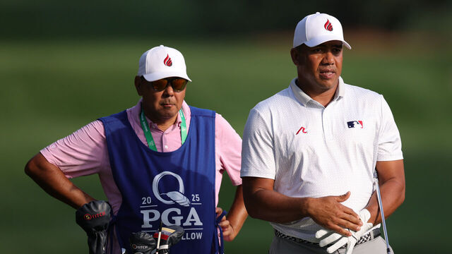 CHARLOTTE, NORTH CAROLINA - MAY 15: Jhonattan Vegas of Venezuela talks with his caddie Oscar Ruben Yorio on the third hole during the first round of the PGA Championship at Quail Hollow Country Club on May 15, 2025 in Charlotte, North Carolina.