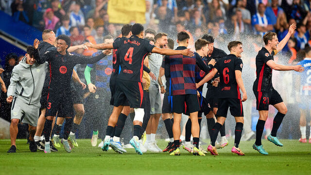 BARCELONA, SPAIN - MAY 15: Barcelona players celebrate after winning their Spanish league football during the LaLiga match between RCD Espanyol de Barcelona and FC Barcelona at RCDE Stadium on May 15, 2025 in Barcelona, Spain.